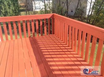 Clean wooden deck after pressure washing