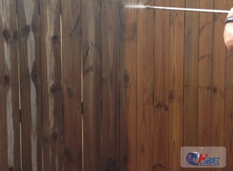 Wooden fence before pressure washing