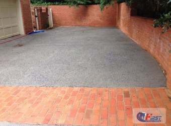 Clean asphalt driveway after pressure washing
