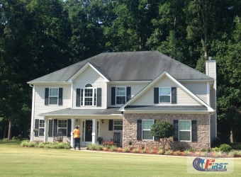 Stained shingle roof before roof cleaning