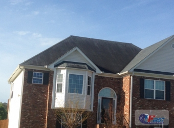 Dirty shingle roof before roof cleaning