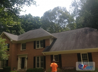 Dirty shingle roof before roof cleaning