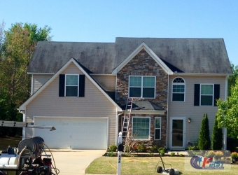 House exterior siding before pressure washing