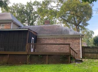 Dirty shingle roof before roof cleaning